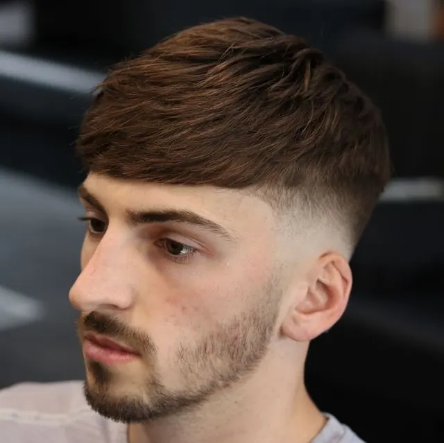 A quiff and beard at Steven Caine